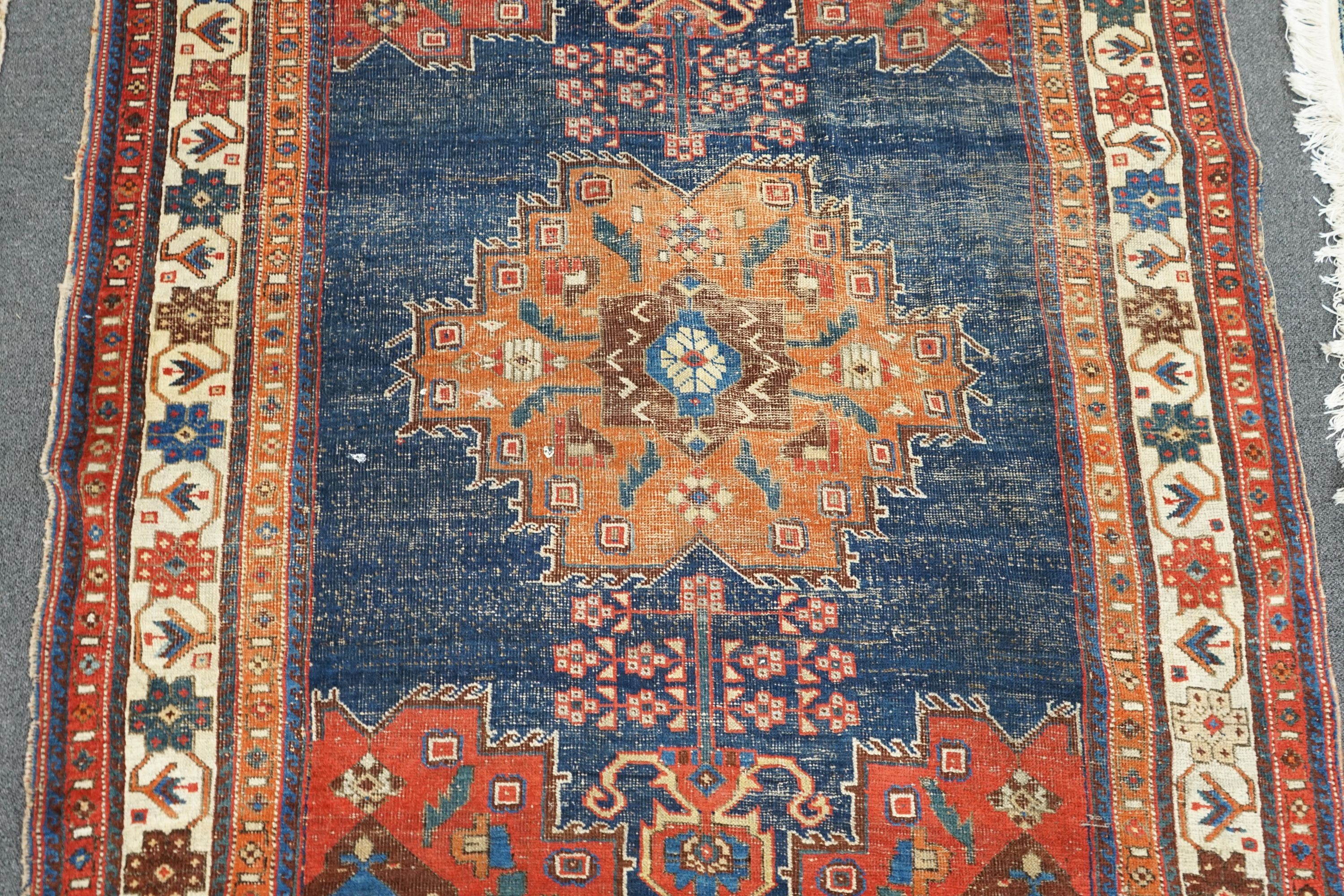 An antique Afshar blue ground rug, 180 x 130cm